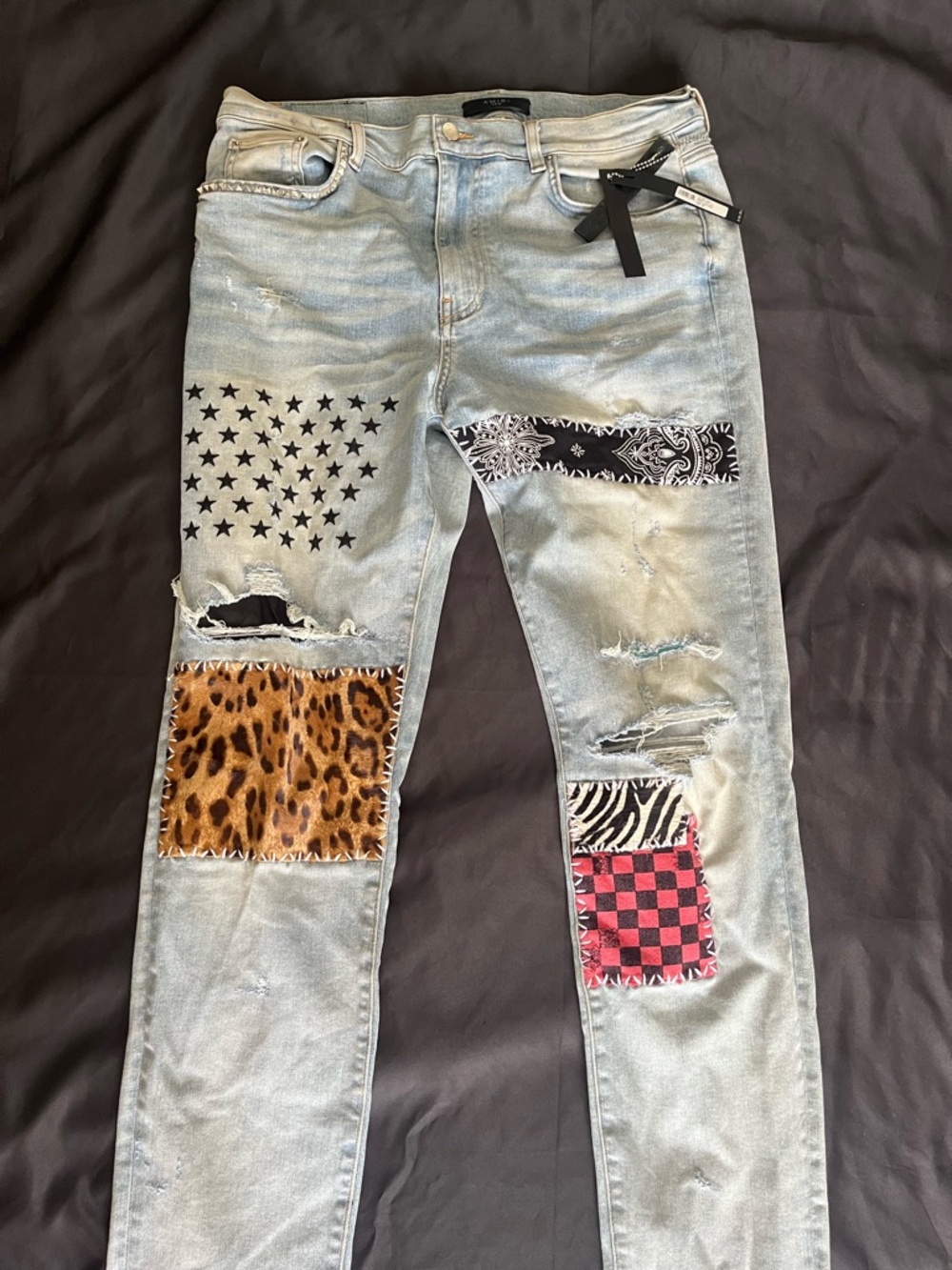 AMIRI Light Blue Denim Jeans with Black Label